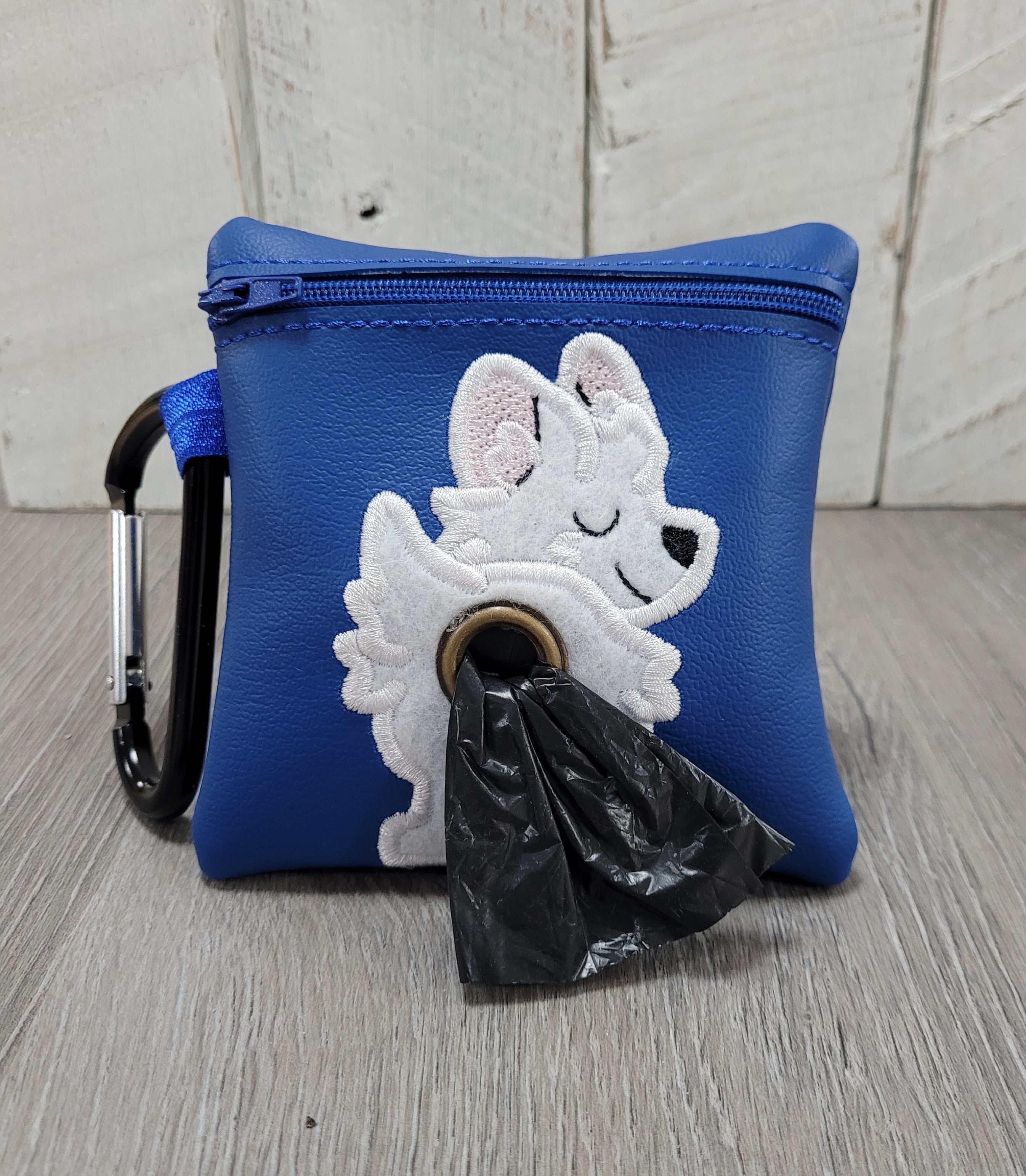 West Highland Terrier on blue